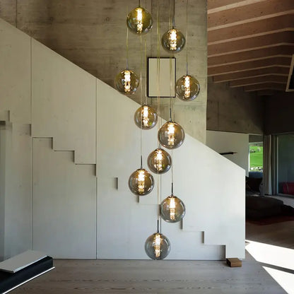 Moderne Sferische Hanglamp met Meervoudige Amber Glazen Bollen