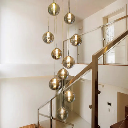 Moderne Sferische Hanglamp met Meervoudige Amber Glazen Bollen