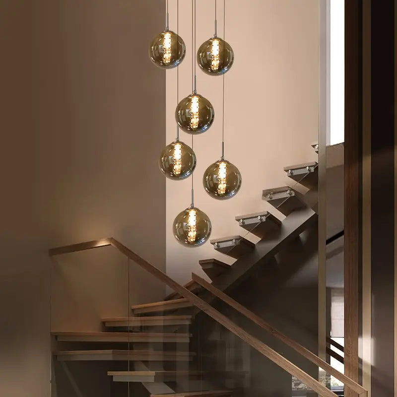 Moderne Sferische Hanglamp met Meervoudige Amber Glazen Bollen