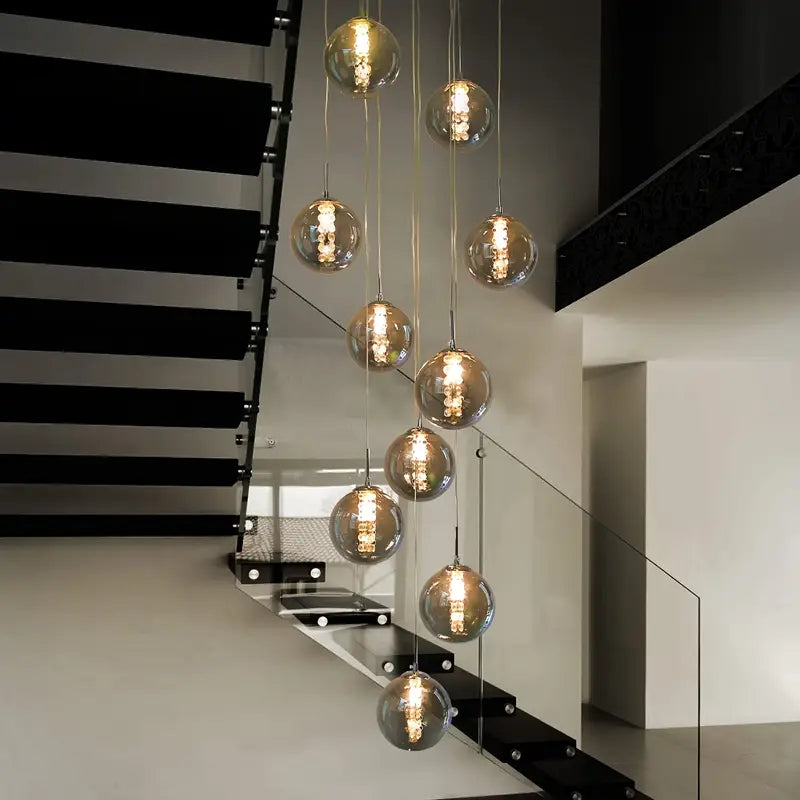 Moderne Sferische Hanglamp met Meervoudige Amber Glazen Bollen
