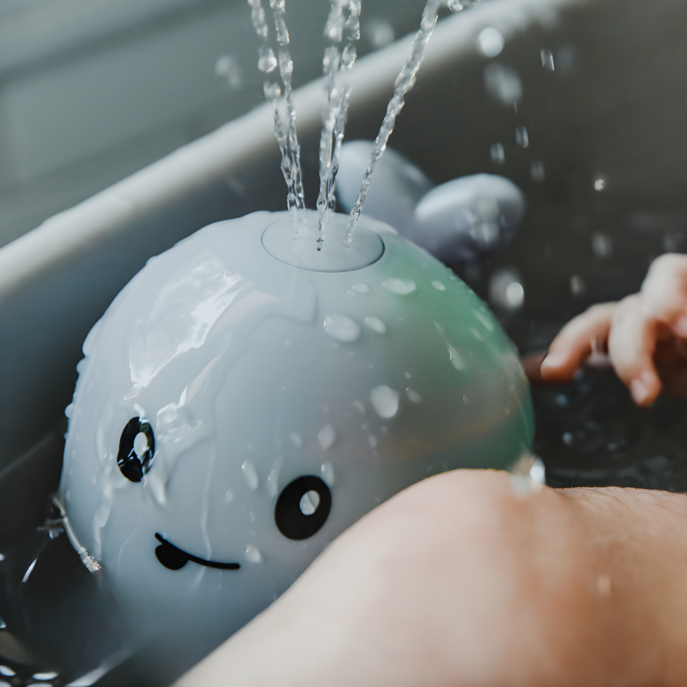 Badspeelgoed Walvis Waterfontein Licht Baby