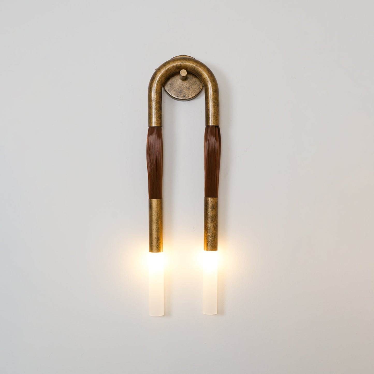 Elegante Wandlamp met Decoratief Paardenhaaraccent