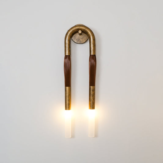 Elegante Wandlamp met Decoratief Paardenhaaraccent