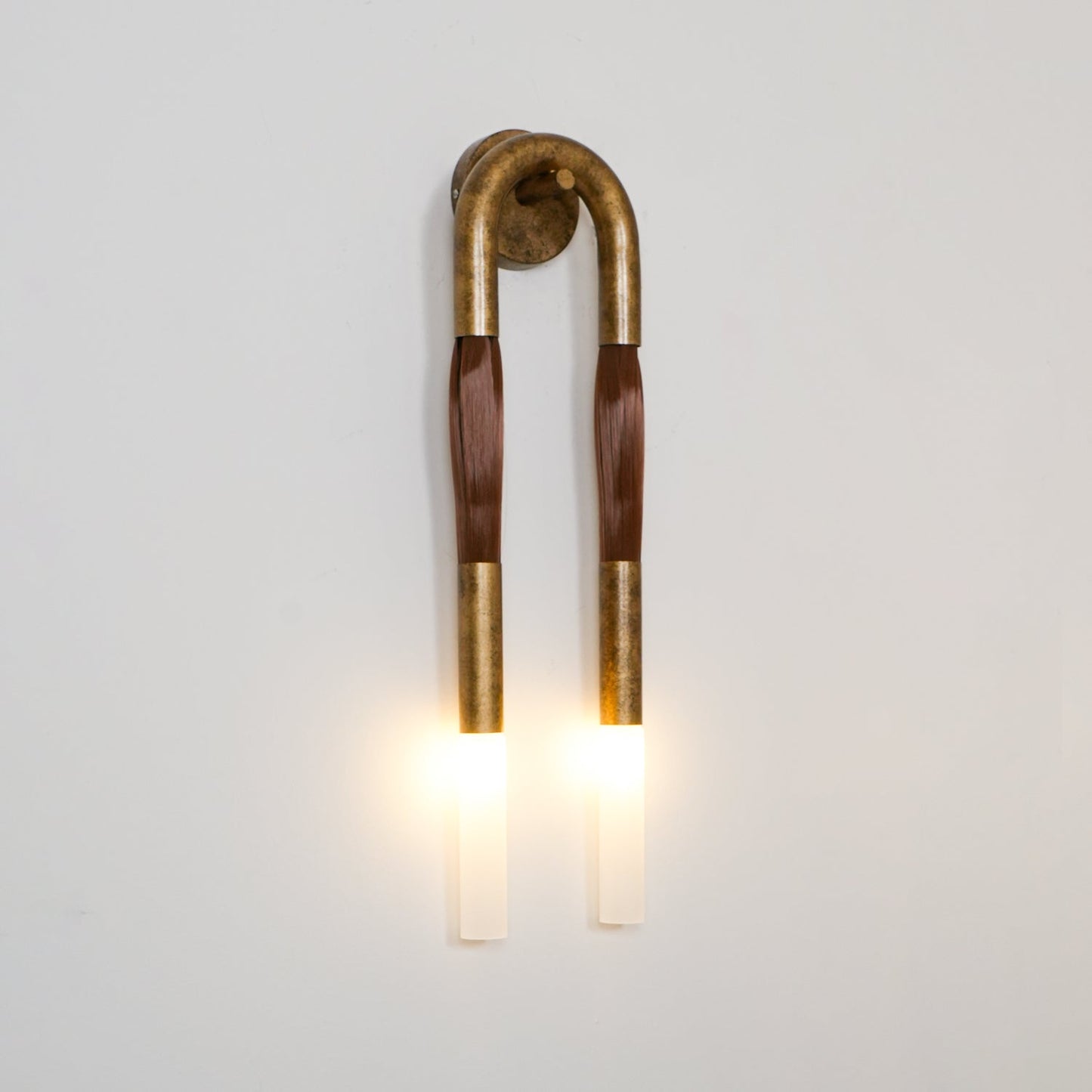 Elegante Wandlamp met Decoratief Paardenhaaraccent