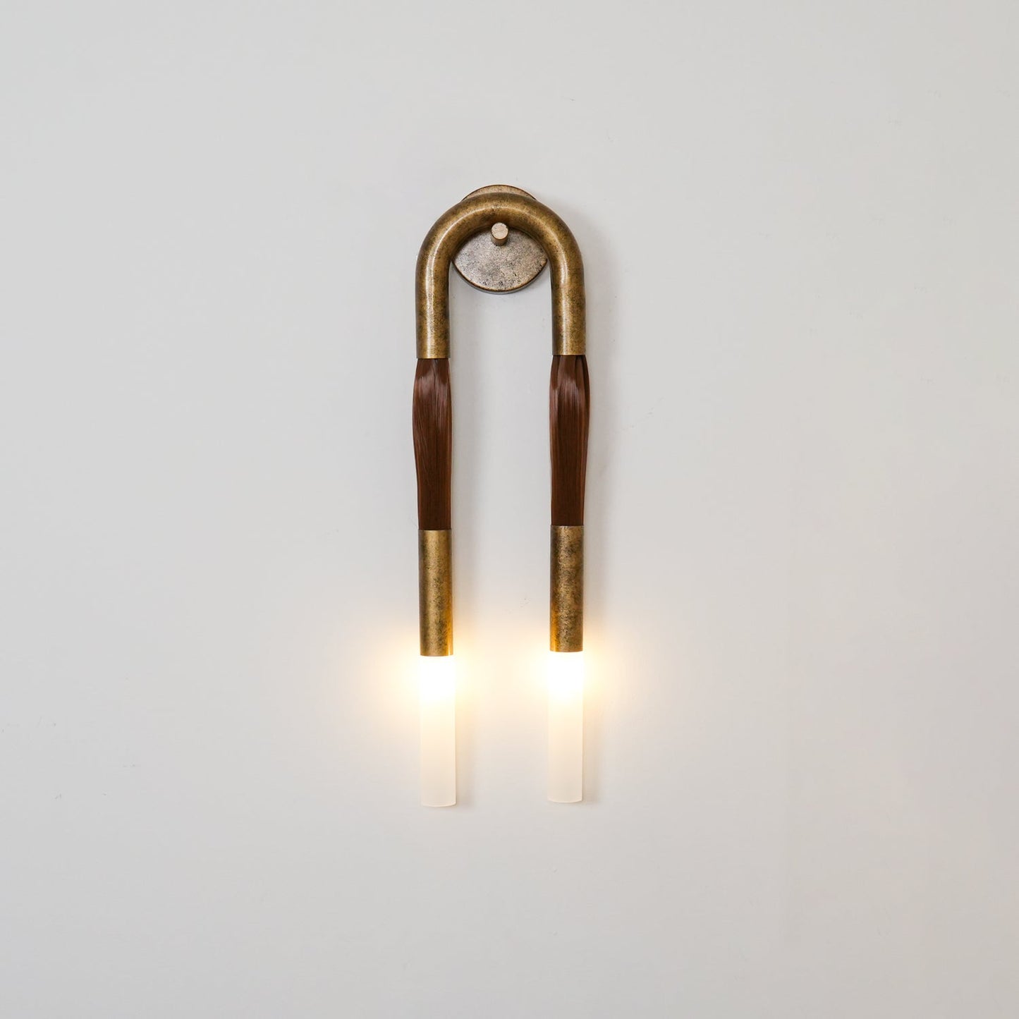 Elegante Wandlamp met Decoratief Paardenhaaraccent