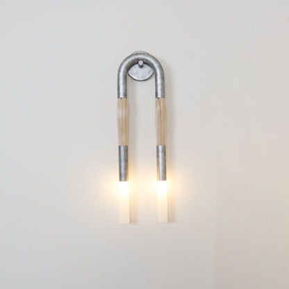 Elegante Wandlamp met Decoratief Paardenhaaraccent