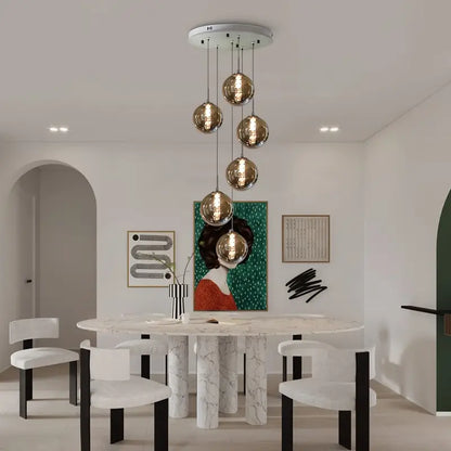 Moderne Sferische Hanglamp met Meervoudige Amber Glazen Bollen